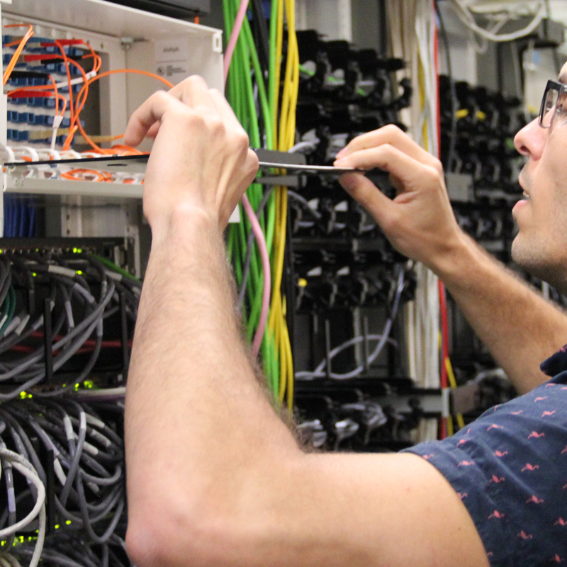 Student working with many wires