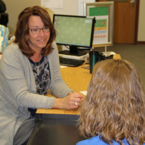 Professor talking to a student