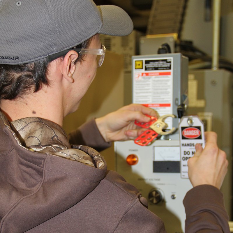 Student working with an electrical box