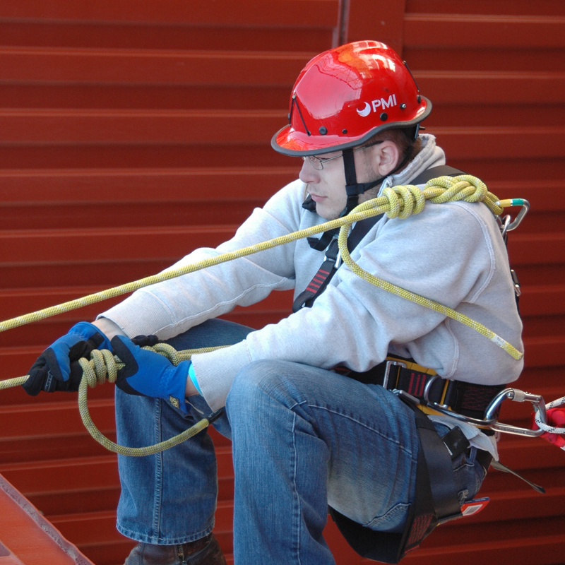 Fireman pulling heavy gear