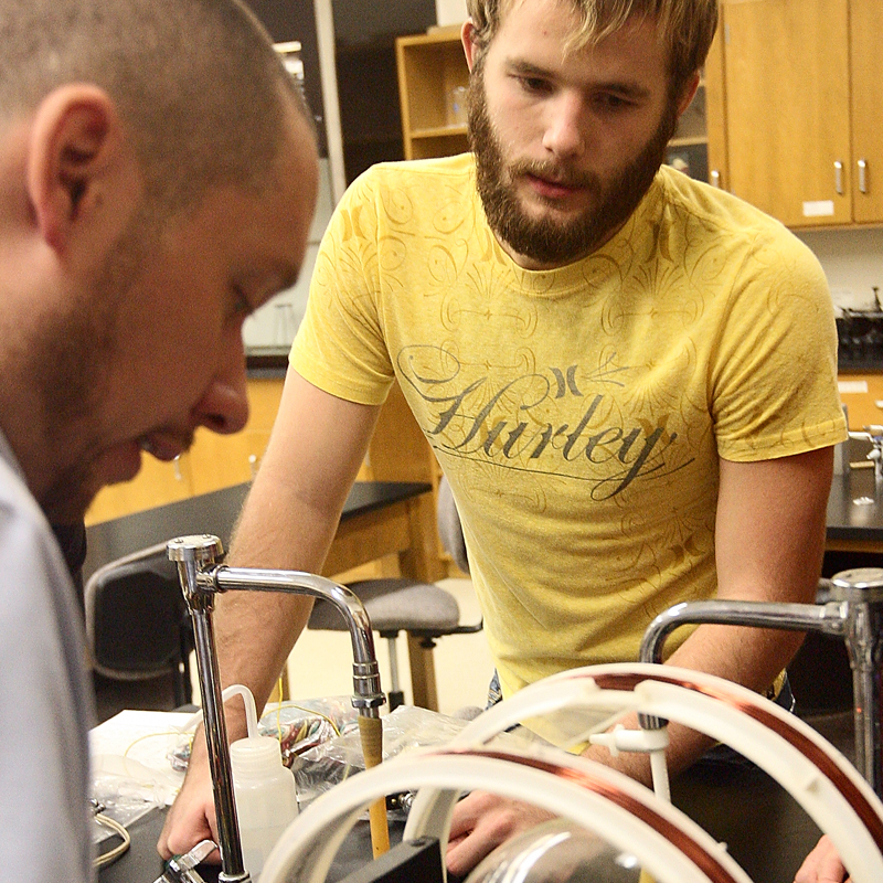 two male students in a college lab