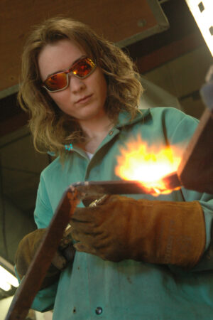 Woman doing welding work