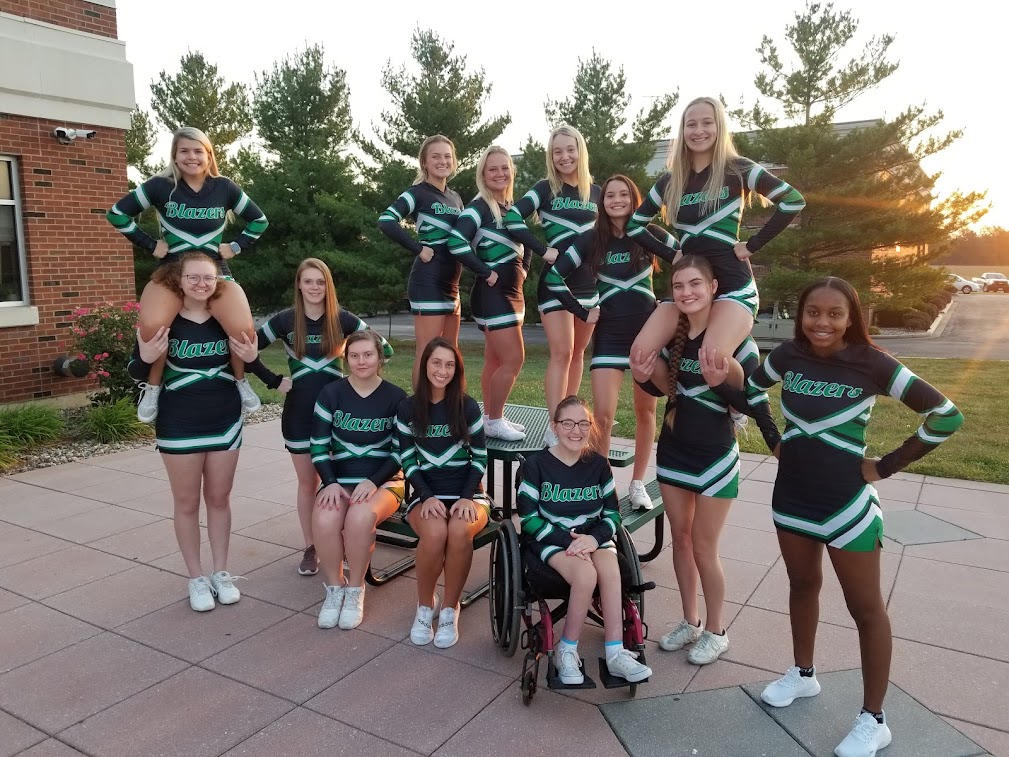 JWCC Student Grace Meyer with the JWCC Cheerleaders