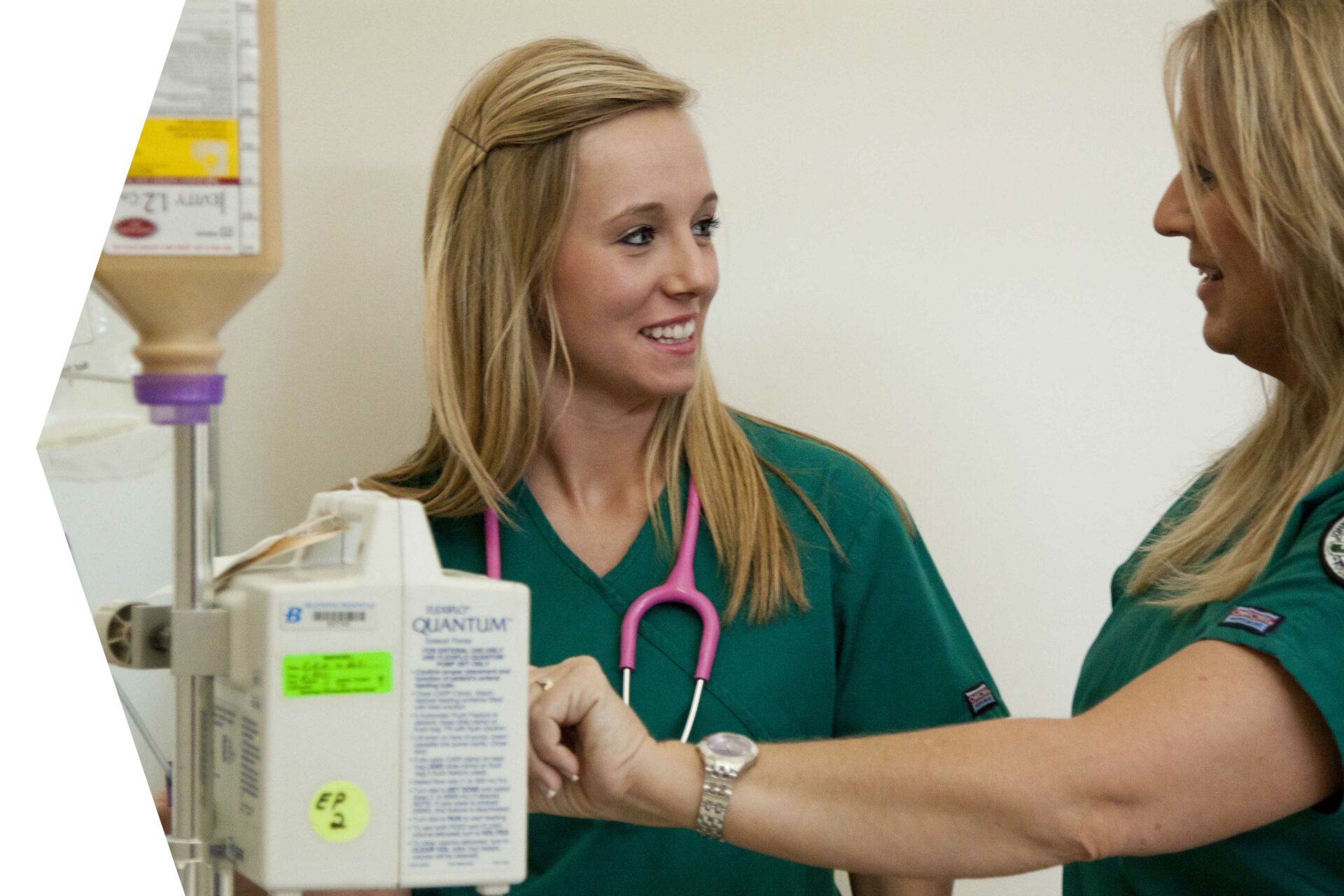 Two healthcare workers on the job.