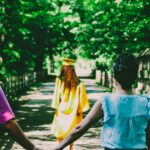 Parents walking with a graduate