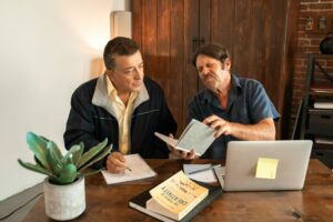 A tutor helping someone learn to read