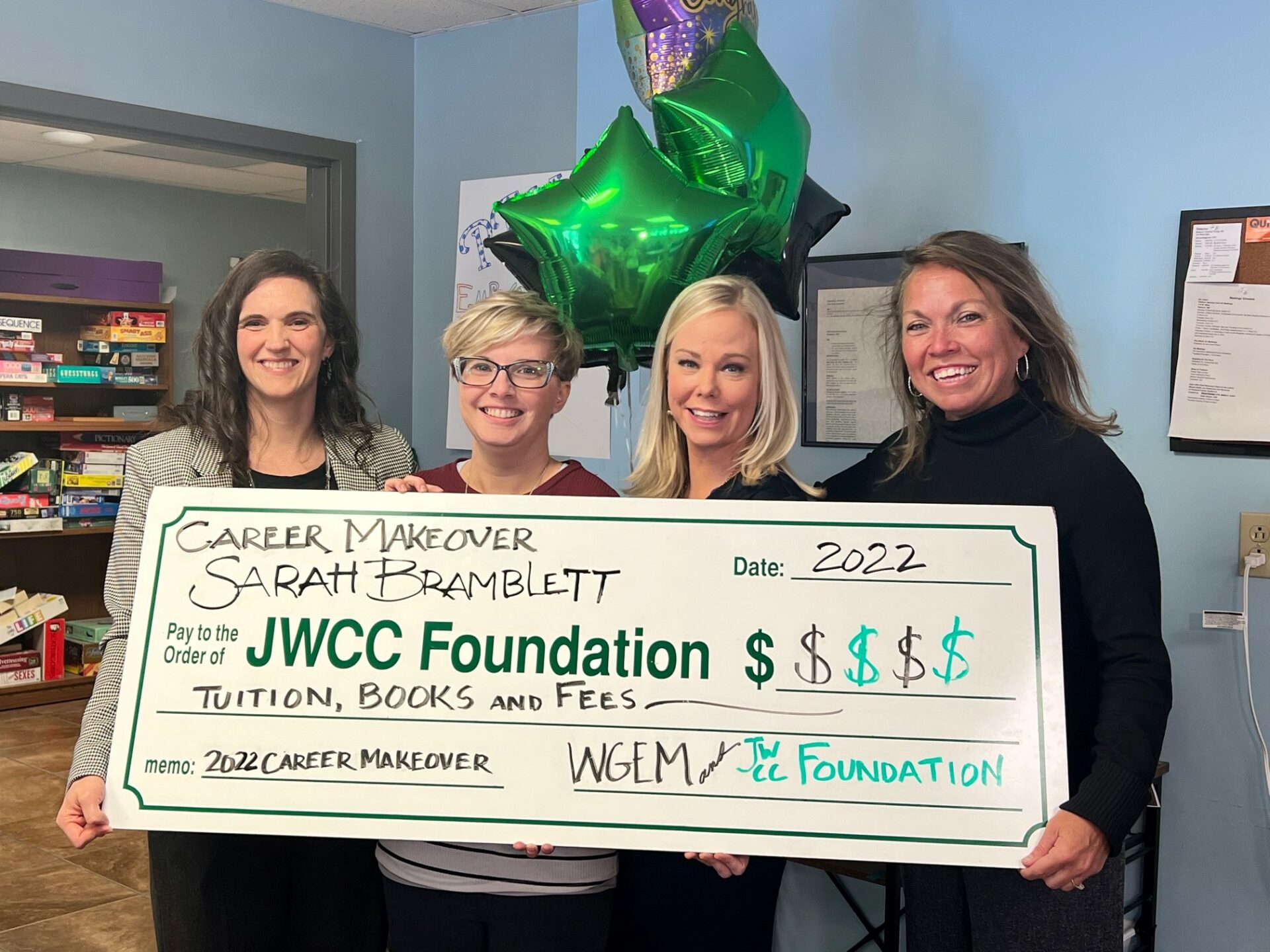 group photo with winner JWCC and WGEM Sarah Bramblett receives Career makeover check