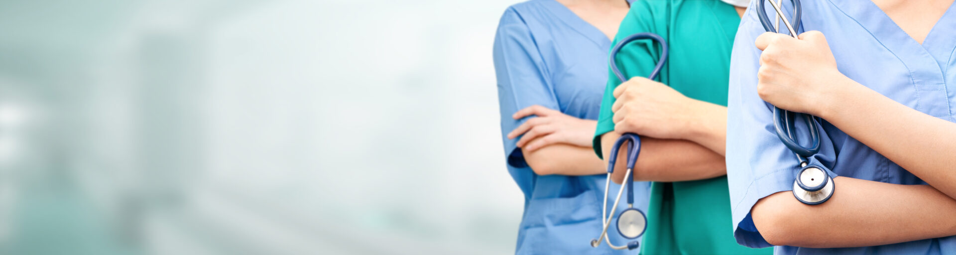 Nurses holding medical equipment