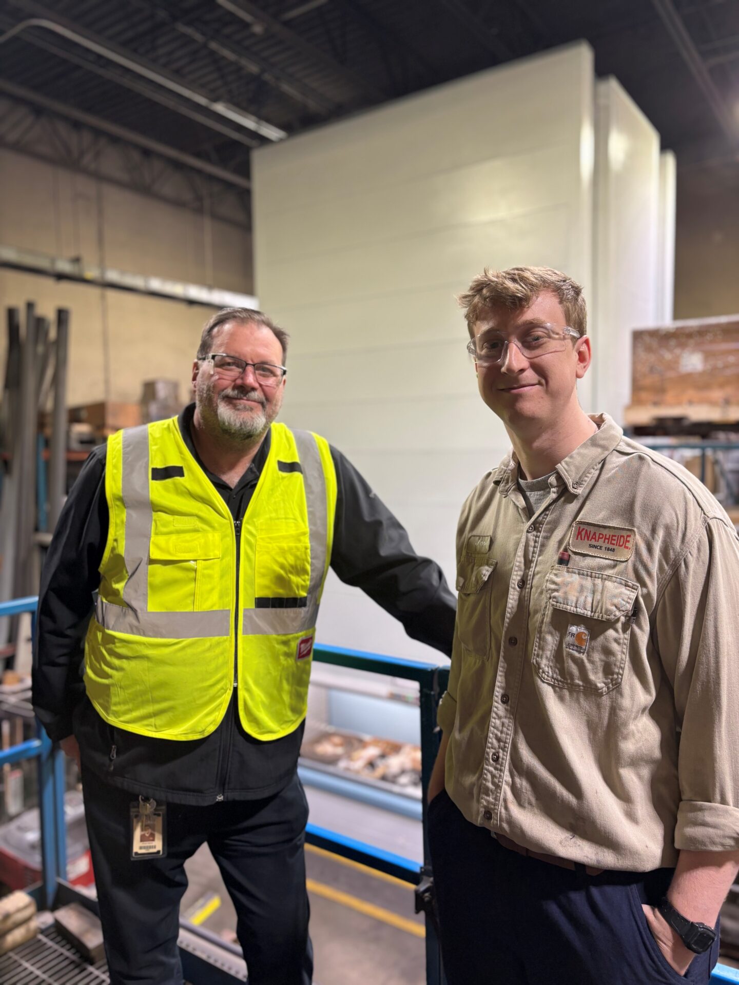 Photo of manufacturing mentor and FAME student at plant