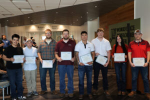 Pictured are the eight students selected for the 2026 Great River FAME cohort following the Signing Day ceremony at John Wood Community College's Workforce Development Center. Students officially signed letters of intent with six regional manufacturing partners and will earn an Associate in Applied Science in Advanced Manufacturing Technology while gaining paid, hands-on experience in the industry.